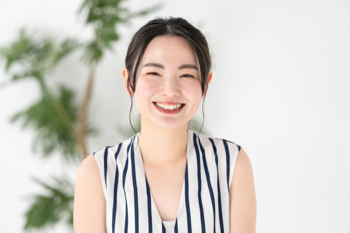 根管治療に満足して笑う女性